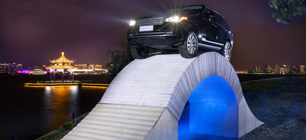 Land Rover continues with brand firsts with paper bridge stunt.
