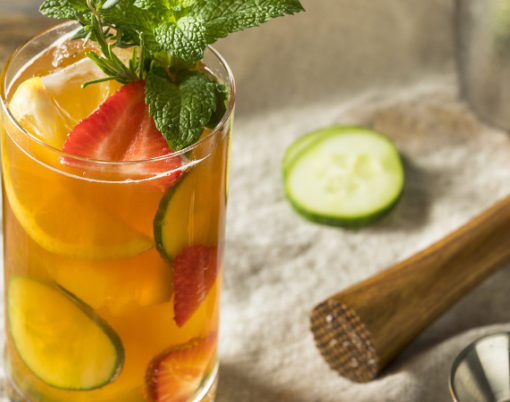 Sweet Refreshing Pimms Cup Cocktail with Fruit and Mint