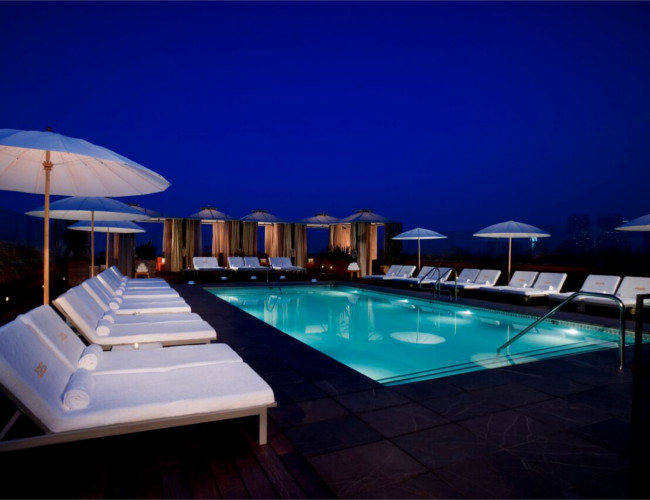 Take a late night swim at  the picturesque SIXTY Beverly Hills hotel. 