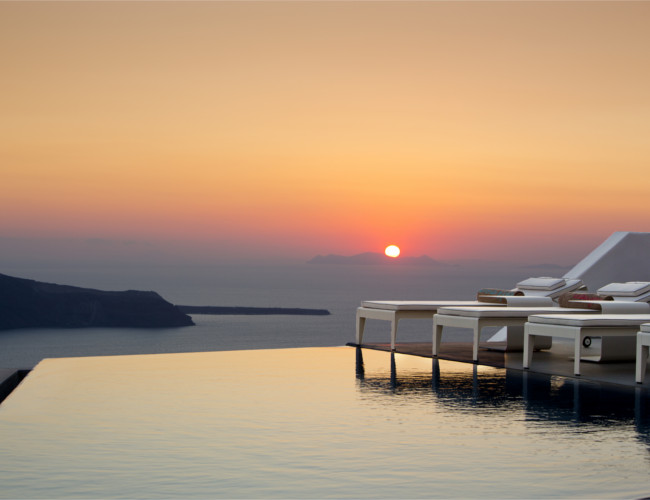 Grace Santorini hotel's beautiful sunset view from the poolside. 