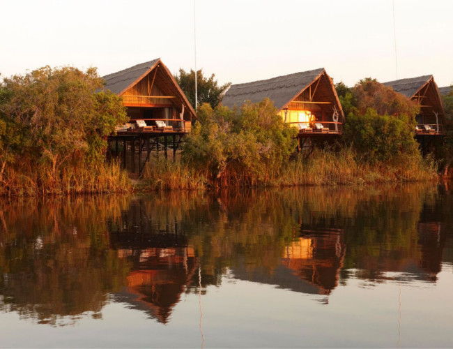 The scenic exterior of the Water Villas Safari River Lodge. 