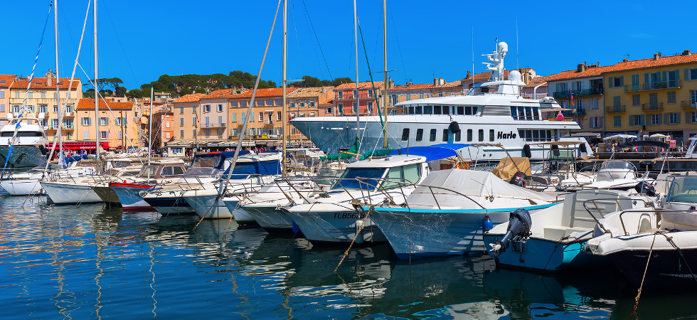 Saint Tropez France - August 03 2016: view in the harbor of Saint Tropez. St Tropez is a seaside resort at the Cote dAzur and popular for the European and American jet set