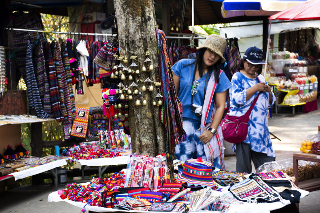 Asian thai people travel and shopping product and food from local shop street market Doi Tung Royal Villa and Mae Fah Luang Garden in Chiang Rai, Thailand