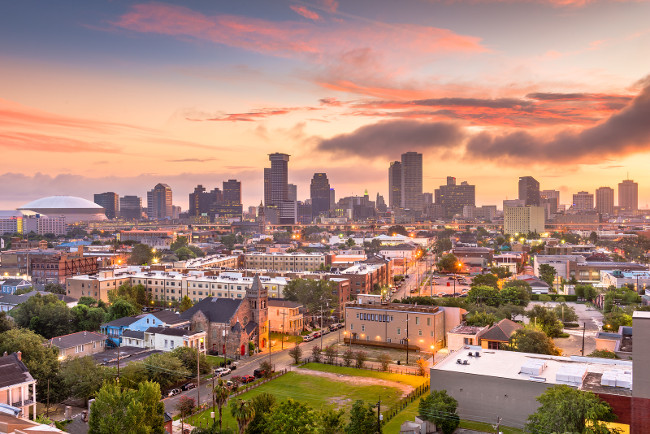 New Orleans, Louisiana, USA downtown city skyline at dawn.