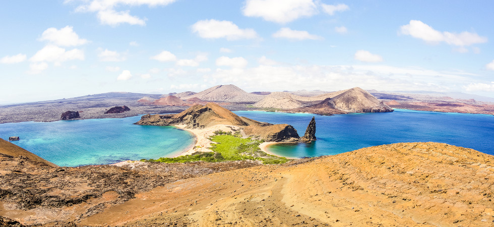 Panoramic view of " Isla Bartolome " at Galapagos Islands archipelago - Travel and wanderlust concept exploring world nature wonders around Ecuador - Vivid filter with warm bright color tones