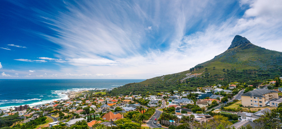 Camps Bay and Lion's Head mountain, amazing panoramic landscape of a coastal city, part of a Table Mountain National Park, Cape Town, South Africa