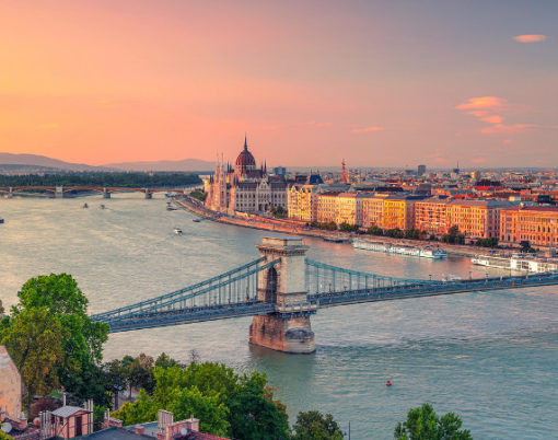 Budapest, Hungary. Panoramic aerial cityscape image of Budapest panorama with Szechenyi Chain Bridge and parliament building during summer sunset.