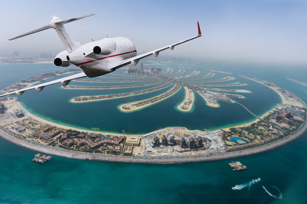 private jet in the sky over Dubai