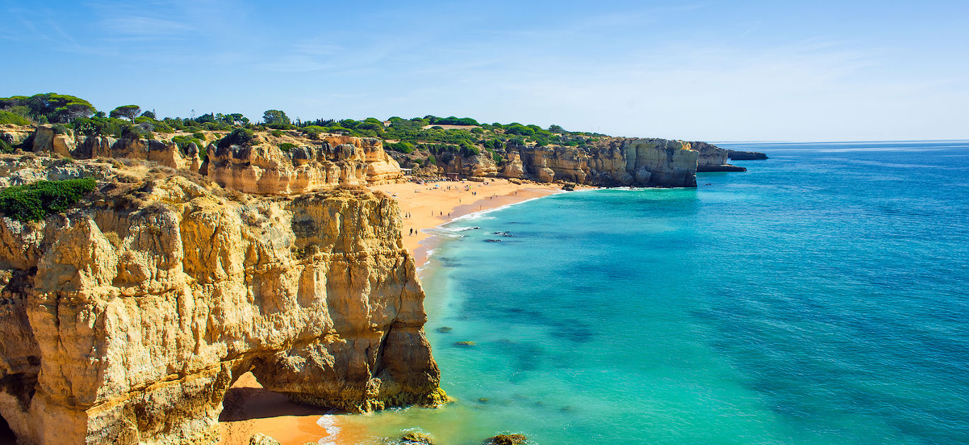 a view of beautiful sandy beach Dona Ana in Lagos Algarve region Portugal