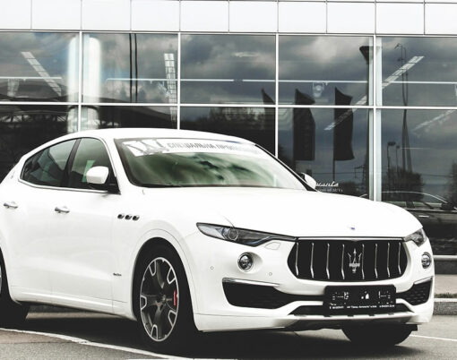 A luxury Maserati Levante car parked in the city. Car for sale. Wallpaper