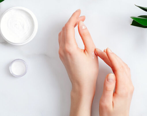 bigstock-Cosmetic-Cream-On-Female-Hands-345266005