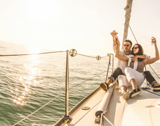 bigstock-Young-Lovers-Couple-On-Sail-Bo-279369679