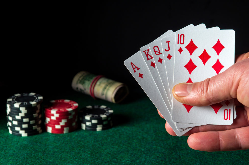 Poker cards with royal flush combination in the game