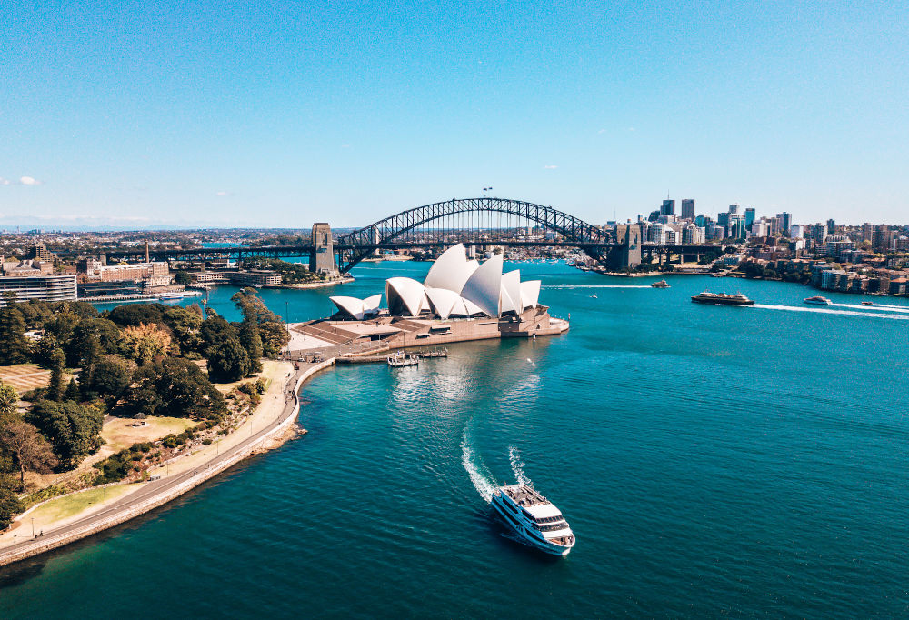 Sydney, Australia. Landscape aerial view of Sydney Opera house near Sydney business center around the harbour.