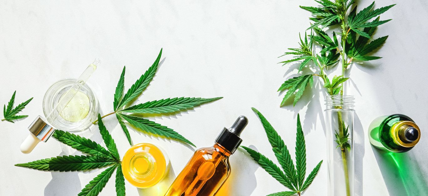 Various Glass Bottles With Cbd Oil, Thc Tincture And Hemp Leaves