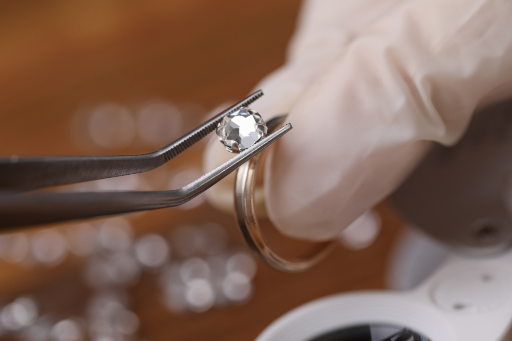 Jeweller inspecting a diamond