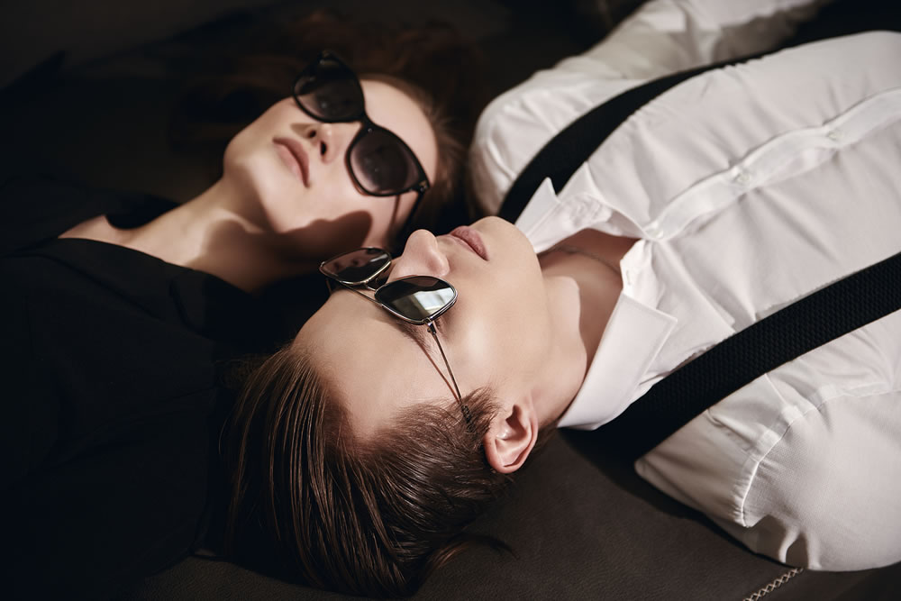 man and woman wearing sunglasses