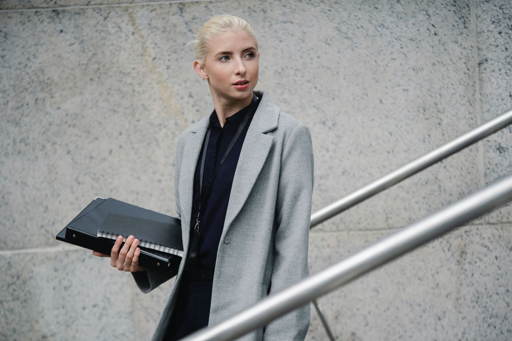 woman in smart grey coat