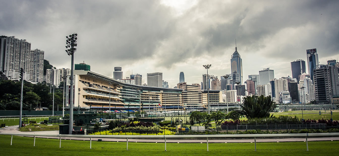 Horse racing at the Happy Valley Racecourse in Hong Kong