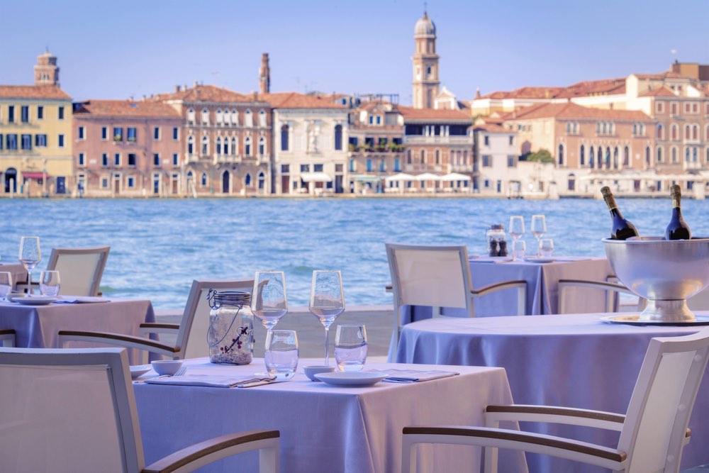 Hilton Molino Stucky Venice outdoor restaurant on water