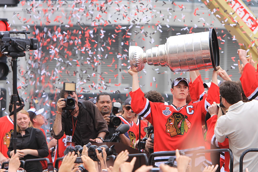 Stanley Cup MVP, Jonathan Toews hoisting the cup at the Stanley Cup Parade in Chicago, Friday June 11, 2010.