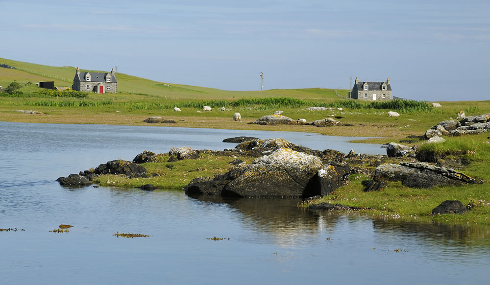 Faoghail a' Chaolais & Cottages at Newtonferry Port nan Long North Uist Outer Hebrides