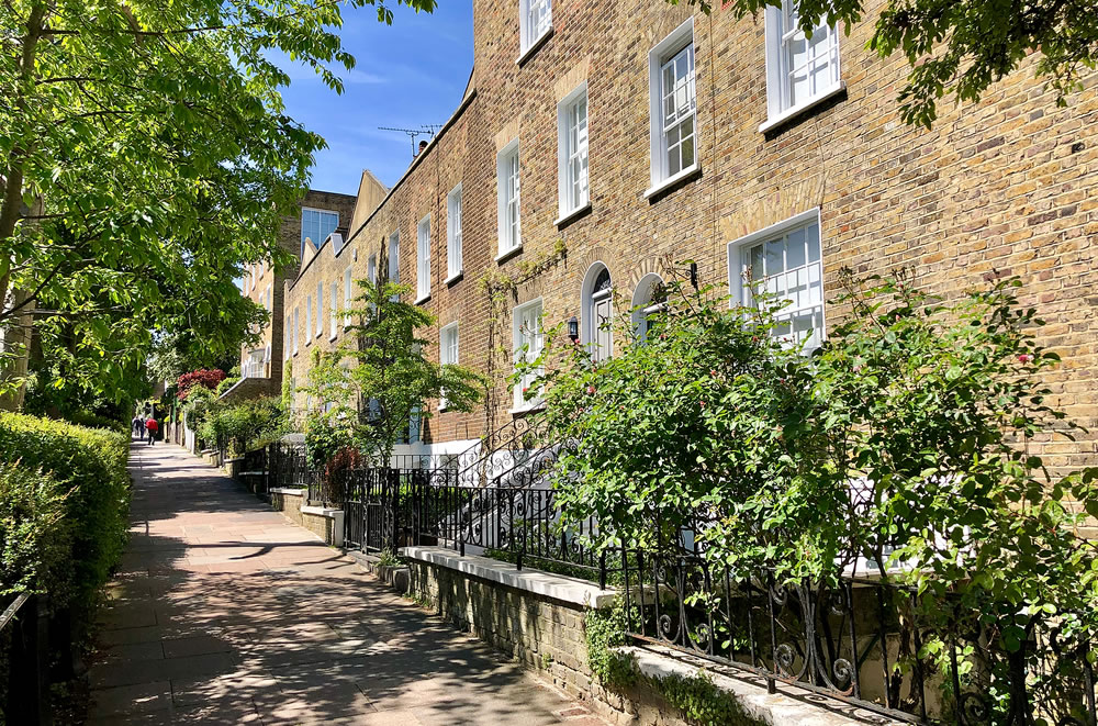 Attractive terraced houses on Flask Walk in Hampstead, North London, UK.