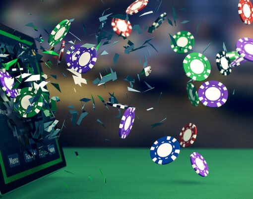 tablet pc with a poker app and poker chips coming out by breaking the glass concept of online gaming (3d render)