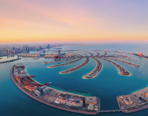 Aerial view of The Palm Jumeirah Island, Dubai Downtown skyline, United Arab Emirates or UAE