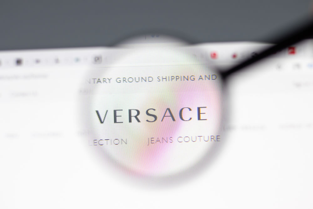 Versace website in browser with company logo, Illustrative Editorial