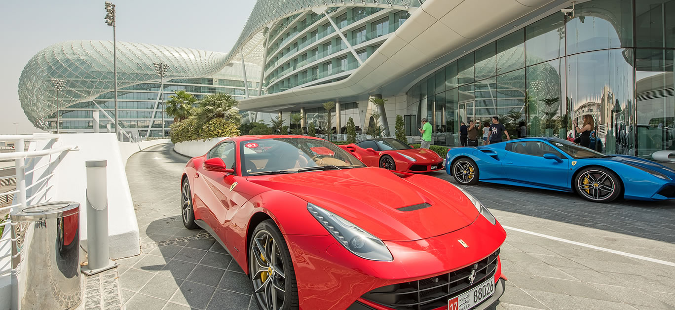 Ferrari cars parked outside the Viceroy Hotel in Abu Dhabi which is known for its hosting of Formula One Grand Prix races