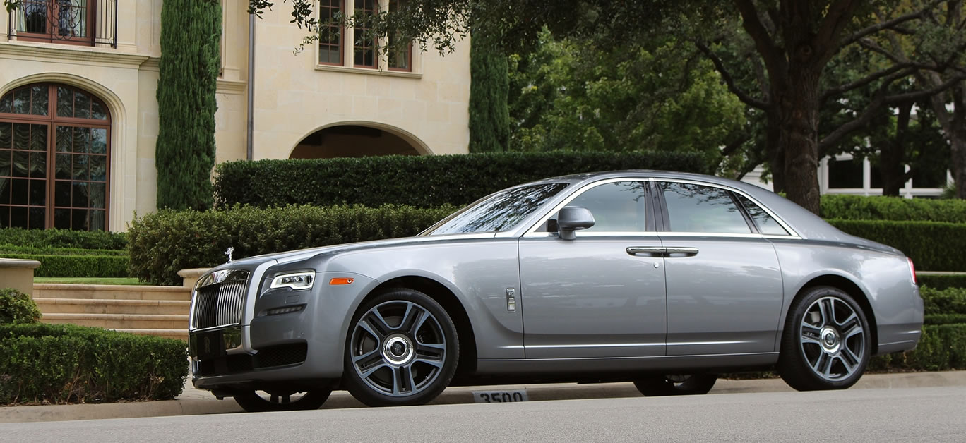 Rolls-Royce Ghost in Jubilee Silver parked on a street of the wealthy Highland Park neighborhood of Dallas, Texas on September 22, 2017.