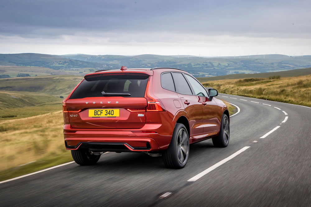 Volvo XC60 Recharge on road from behind