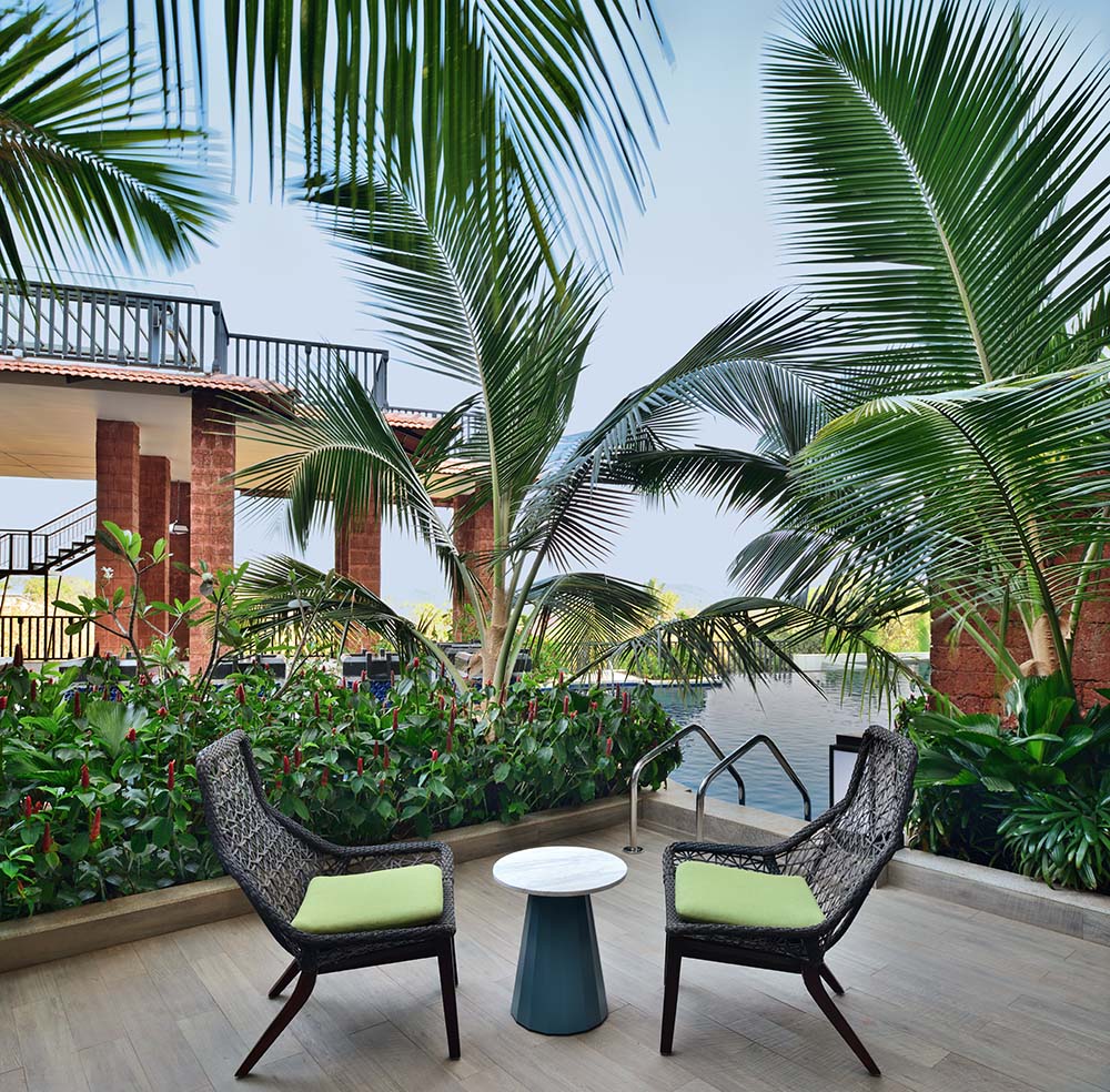The Westin Goa's pool patio room