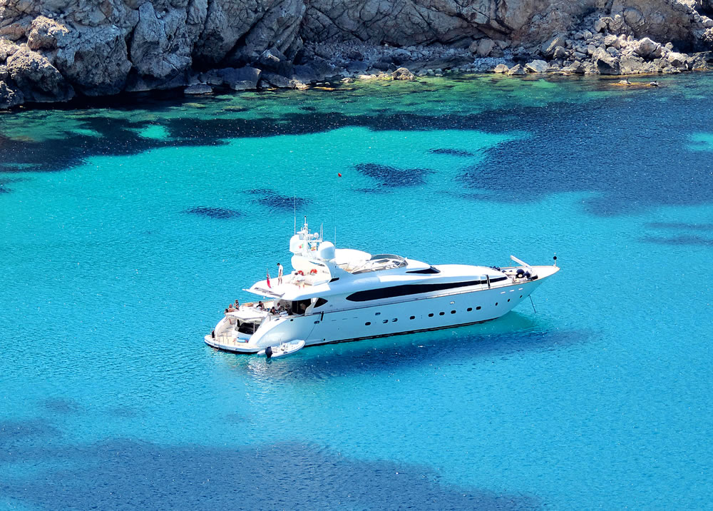 Luxury boat anchored in a bay, luxury yacht