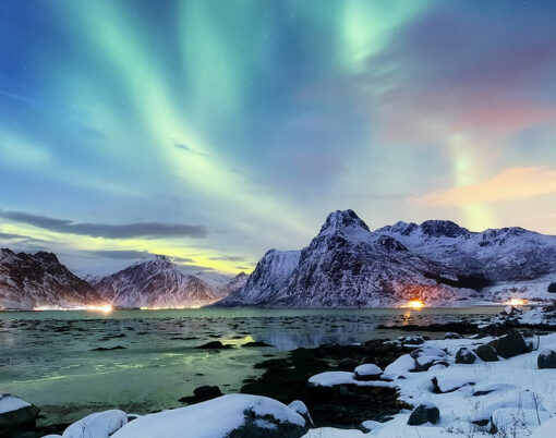 Aurora borealis on the Lofoten islands, Norway. Green northern lights above mountains