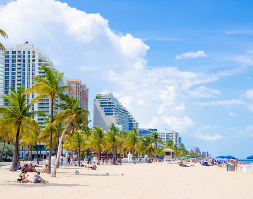 People enjoying the beach at Fort Lauderdale in Florida on a summer day