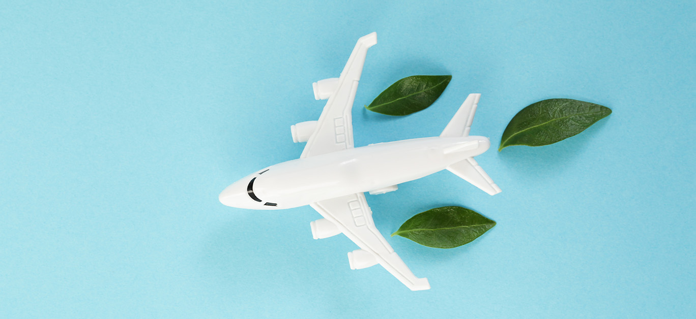 White airplane model depicting sustainability
