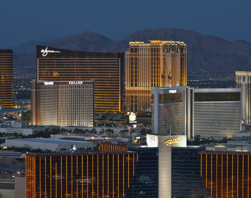 Night view towards of the trendy Rio Wynn and Treasure Island resorts in the heart of the strip in Las Vegas Nevada
