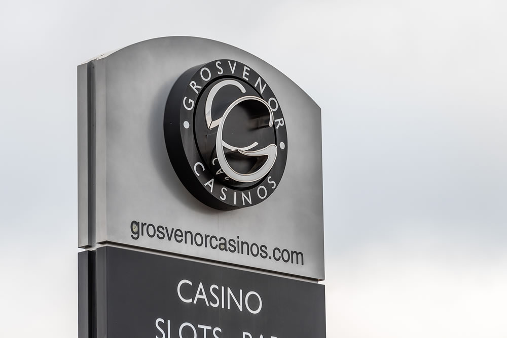 Grosvernor Casinos logo sign stand.