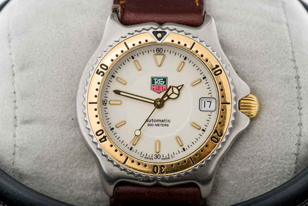 A Tag Heuer watch close up on an isolated background