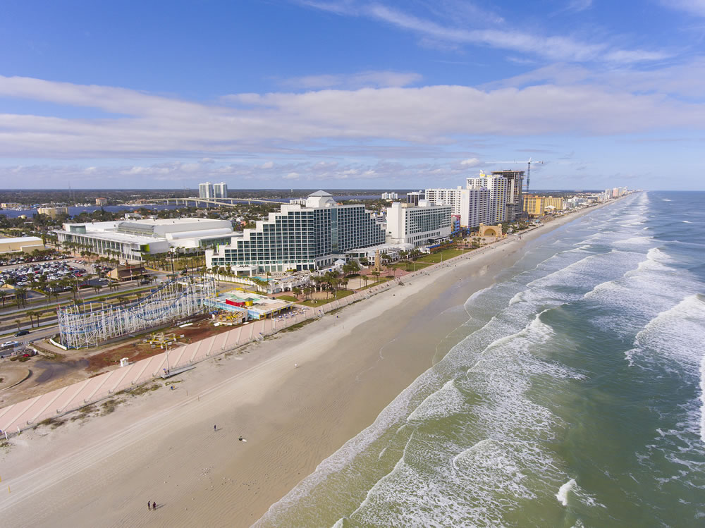 Daytona Beach Hilton and oceanfront aerial view in a cloudy day, Daytona Beach, Florida FL, USA.