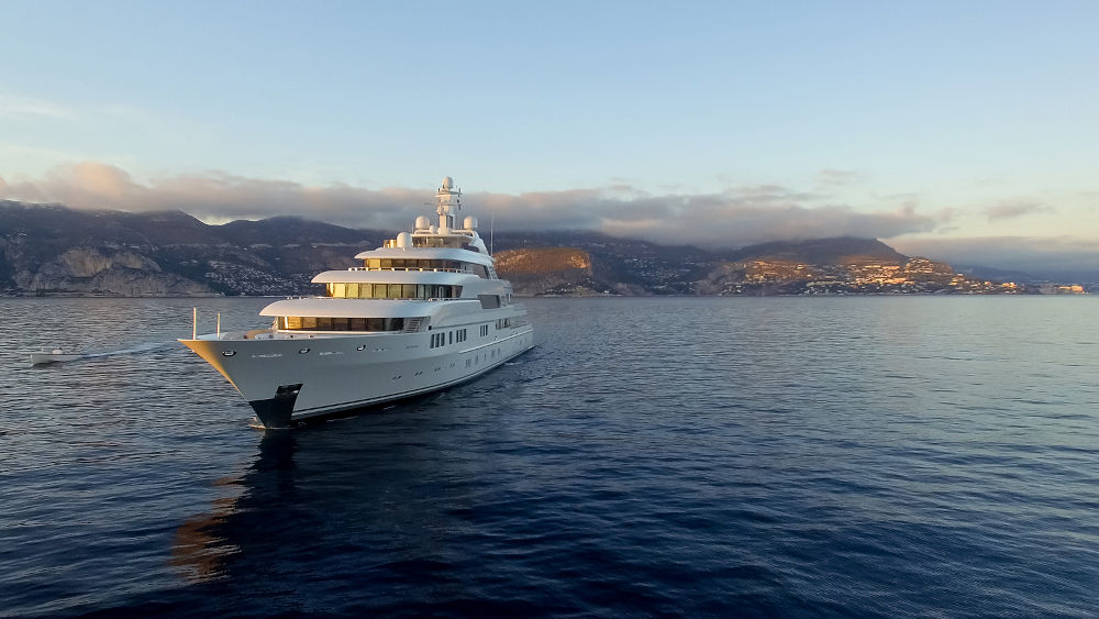 large private super motor yacht underway in the ocean