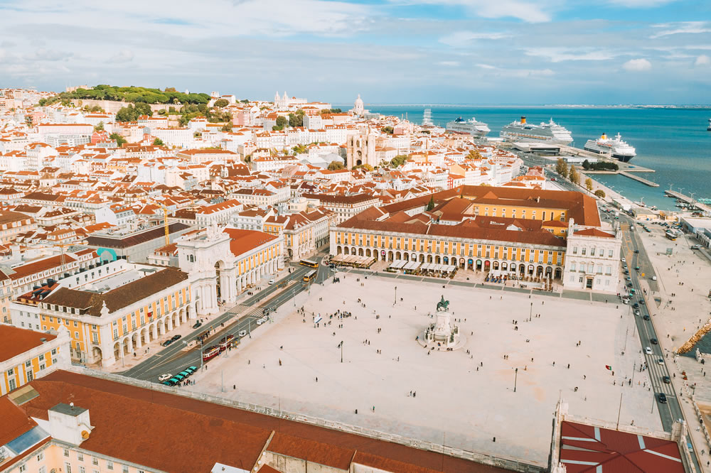 Aerial view of the famous Praca do Comercio (Commerce Square) - one of the main landmarks in Lisbon . Beautiful Portuguese architecture