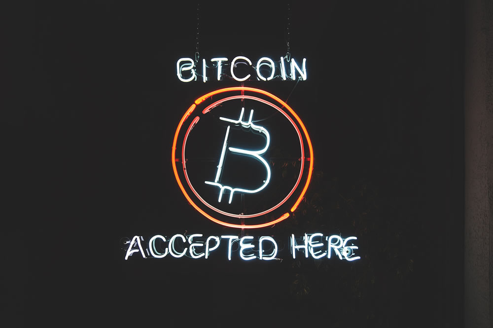 bitcoin accepted here sign