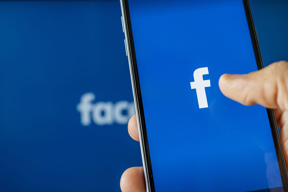 Phone showing facebook app on the screen