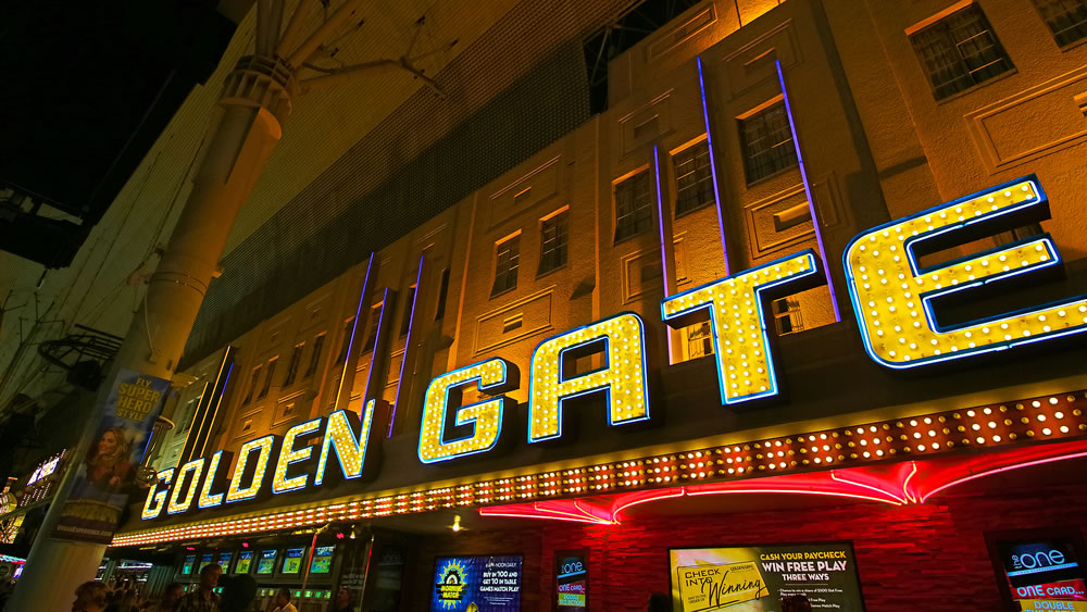 Golden Gate Hotel & Casino sign illuminated by night in Las Vegas