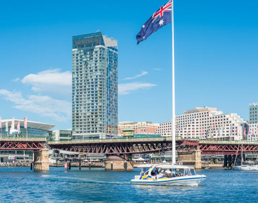 Darling Harbour Harbourside with luxury waterfront hotels and restaurants. Sofitel, Ibis hotel and Novotel hotels buildings