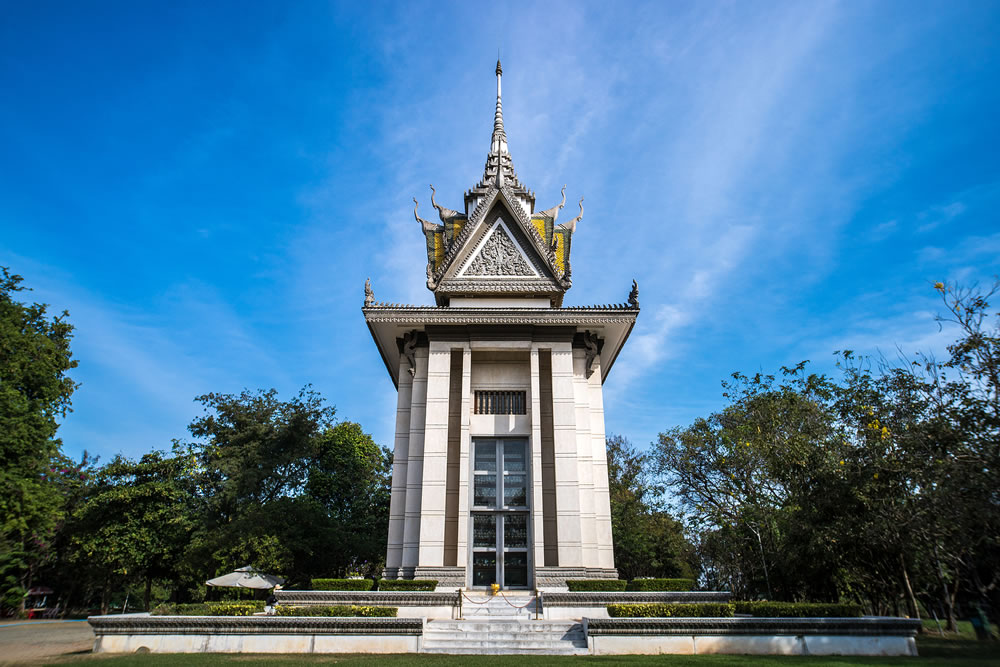 The memorial stupa of Choeung Ek Killing Fields, containing some of the Khmer Rouge victims remains. Near Phnom Penh, Cambodia