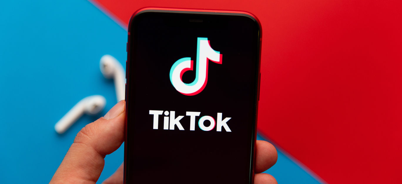 Tik Tok logo on iPhone display